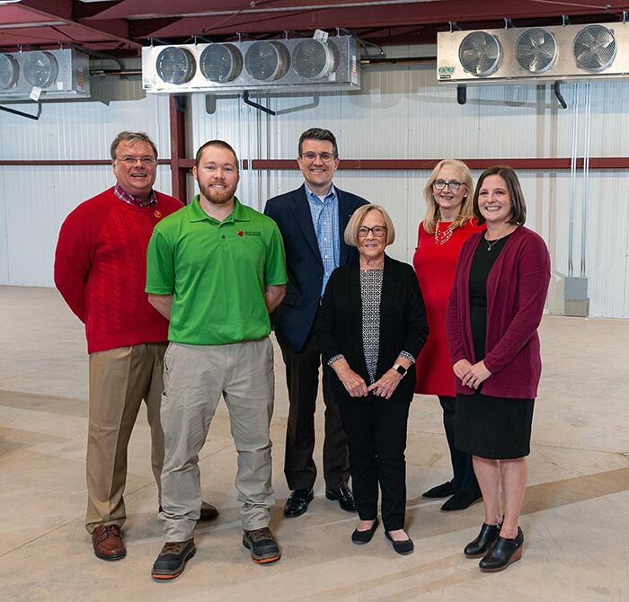 In the new cooler space ae, from left, Lions Club Teasurer Dave Pearson, River bend Food Bank Galesburg Branch Site Director Aaron Baron, Galesburg Community Foundation President & CEO Josh Gibb, FISH of Galesburg President Diane Copeland, Lions Club Past President Kim Norton, and FISH of Galesburg Executive Director Elizabeth Culbertson.